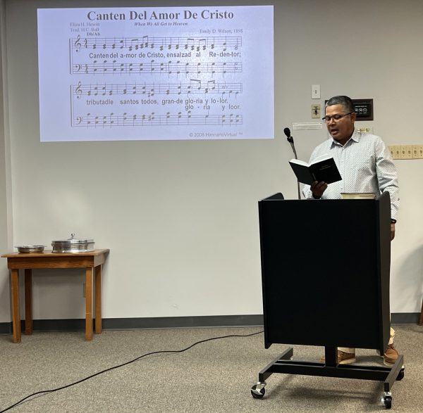 Richard Garcia leads singing during the Bridgewood Church of Christ's Spanish assembly on a recent Sunday.