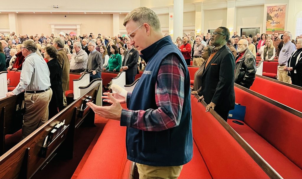 Attendees stand to sing at the Telling the Story Conference on Evangelism and Church Growth at Prestoncrest Church of Christ in Dallas.