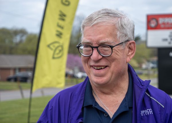Andy Borchers, pictured outside the school auditorium where the New Garden Church meets in Hermitage, Tenn., reflects on the congregation's history.