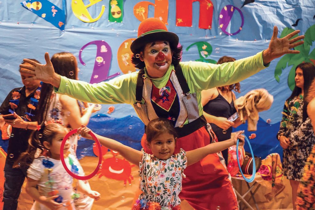 Clowns and magic tricks were part of the festivities as the ESPERO School for Deaf Adults hosted a summer festival on its campus in western Honduras.