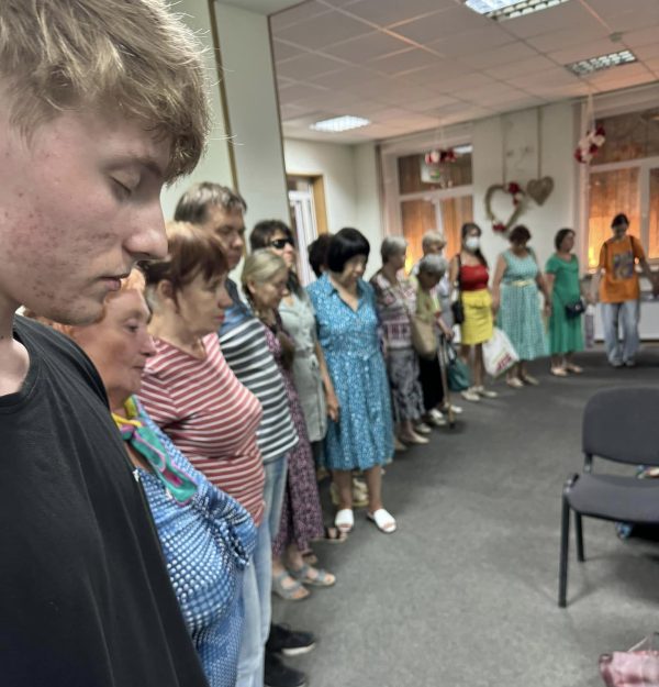 Christians worship during a late-June Sunday service in Kramatorsk, Ukraine. "I was expecting six for worship in the frontline city of Kramatorsk, and God brought 60!" said Jeff Abrams, minister for the Tuscumbia Church of Christ in Alabama, who made a 20-hour train trip from western Ukraine to visit the congregation. At far left is a young man who rode his bike from Slavyansk, about 10 miles away, to worship with the church.